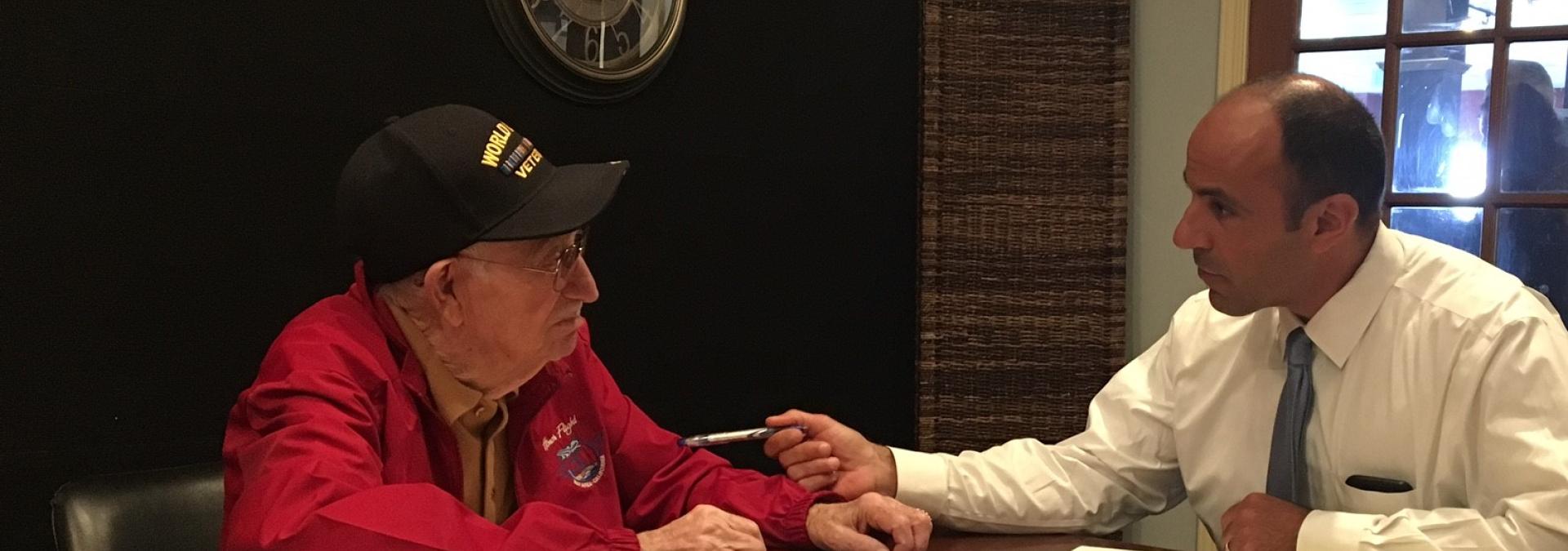 Military soldier saluting American flag