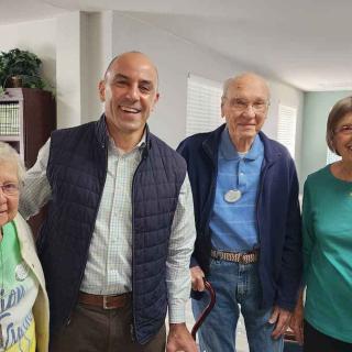 Seniors posing with their congressman